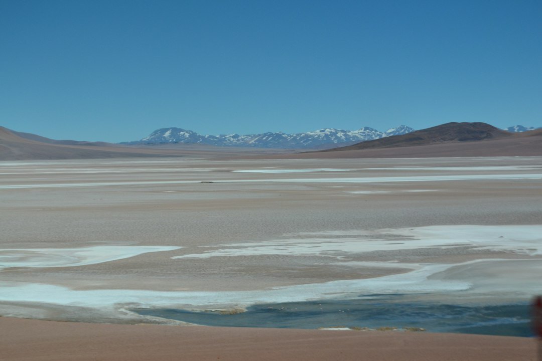miner looking at stars in atacama desert