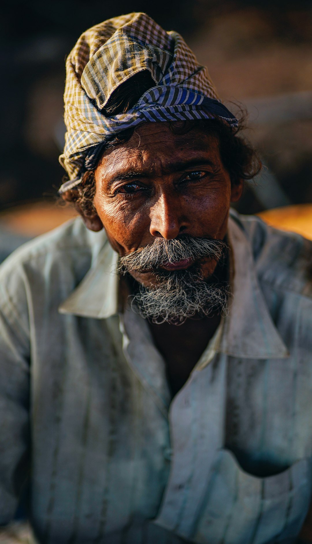 elderly miner smiling under stars