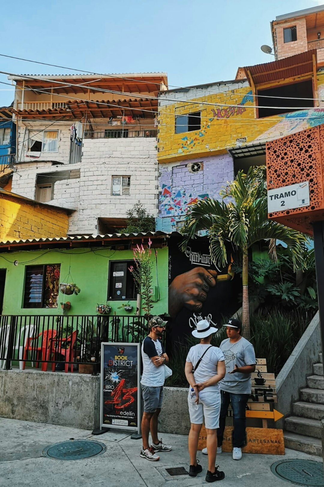 local people looking at mural